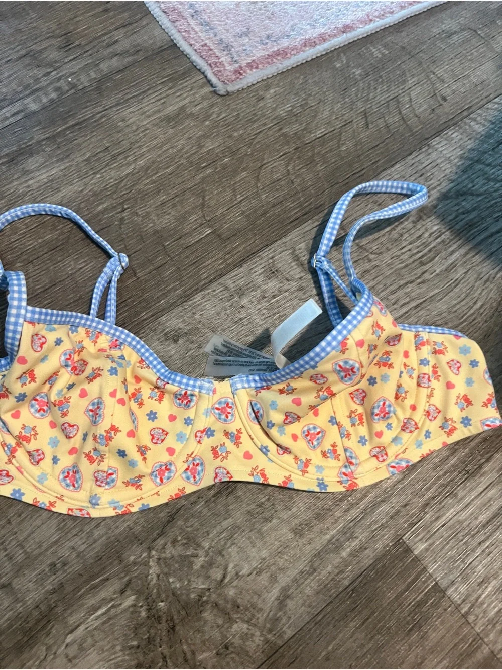 Frankie’s bikinis vs pink buttercup bikini top in yellow and blue